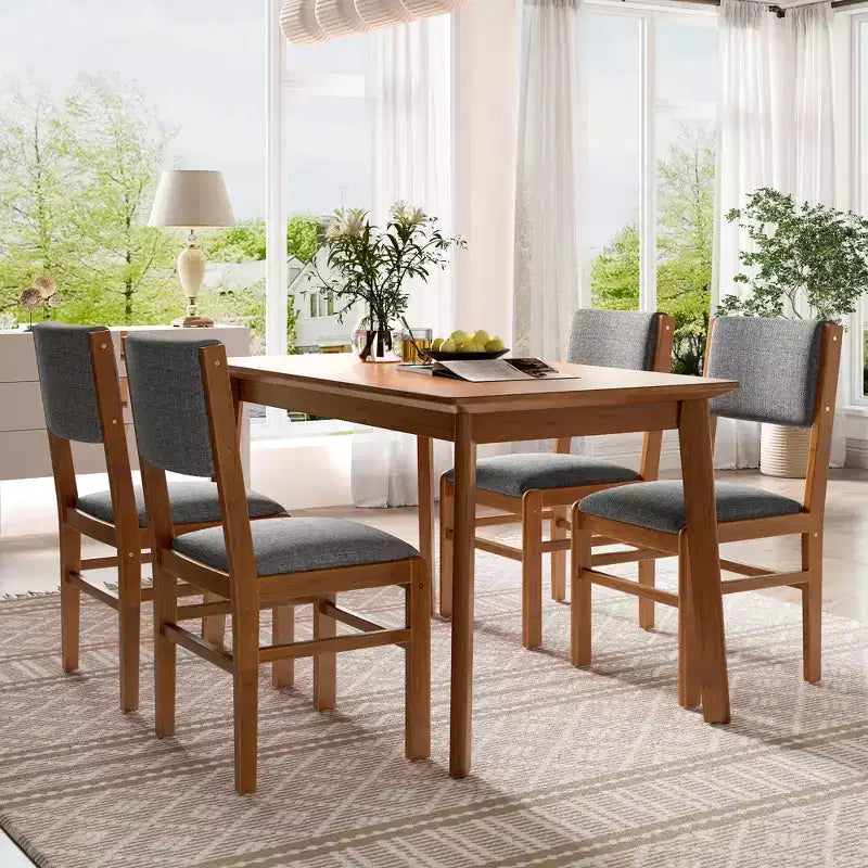 Ensemble de salle à manger compact pour 4 personnes, 5 pièces, style rétro, avec table rectangulaire en bois et 4 chaises rembourrées.