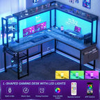 Bureau d'angle informatique Besiost avec étagère et lumières LED, bureau en L avec prise de courant
