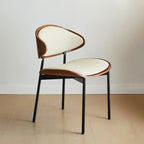 Chaise de salle à manger à dossier incurvé en cuir noir