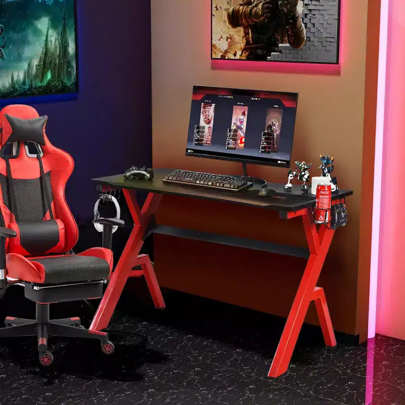 Bureau de jeu Costway avec rangement pour manettes et casque, tapis de souris et porte-gobelet