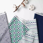 Bacati - Panier à Linge Pliable Noah Menthe/Bleu Marine