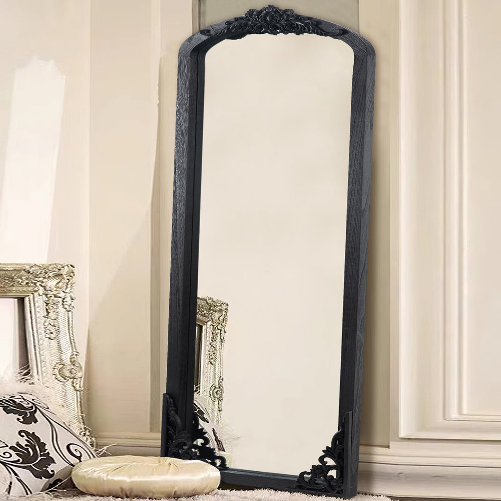 Miroir sur pied en bois massif sculpté en plein cintre